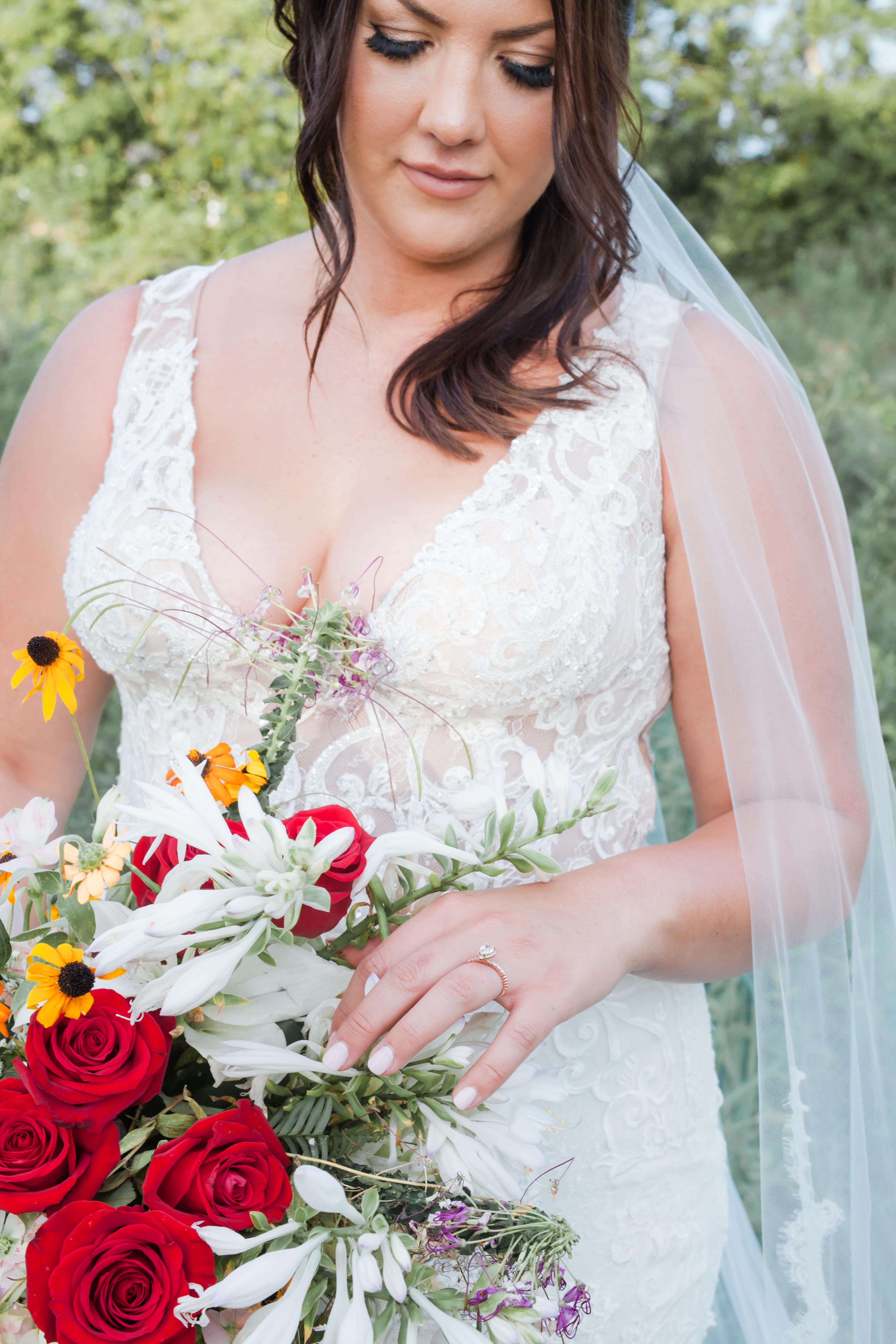 bride and ring and wild flowers